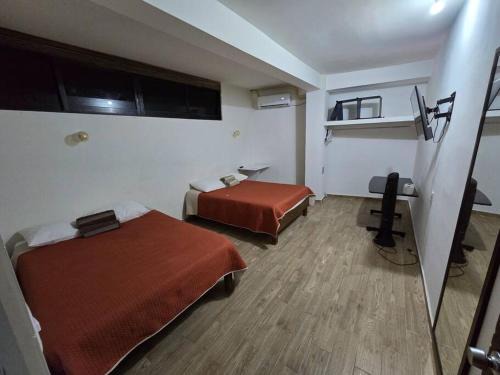 2 Recamaras con clima y cocina centrico, wifi, tv smart