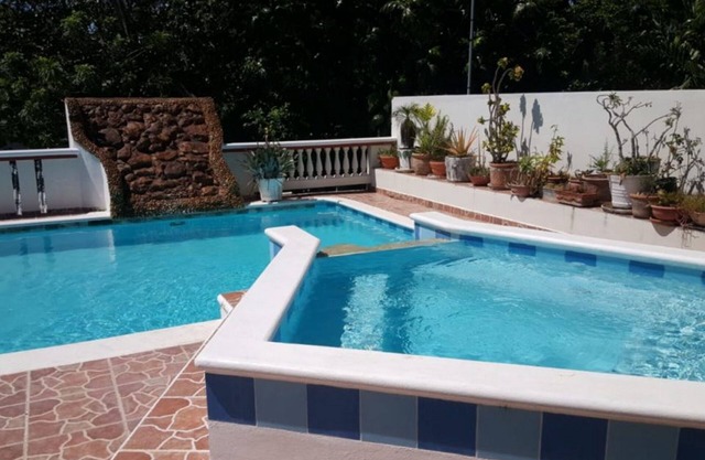 2BD 2BTH condo steps from surfing beach!