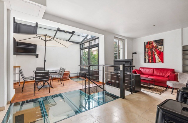 80 m² duplex loft-style architect-designed apartment with private garden