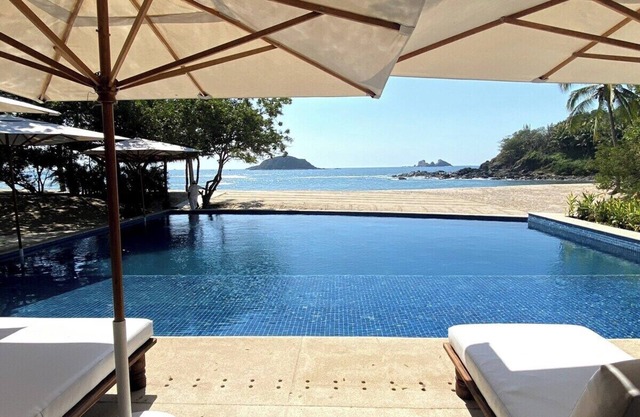 A luxurious beachfront house in Ixtapa Zihuatanejo's secure Arcano Development