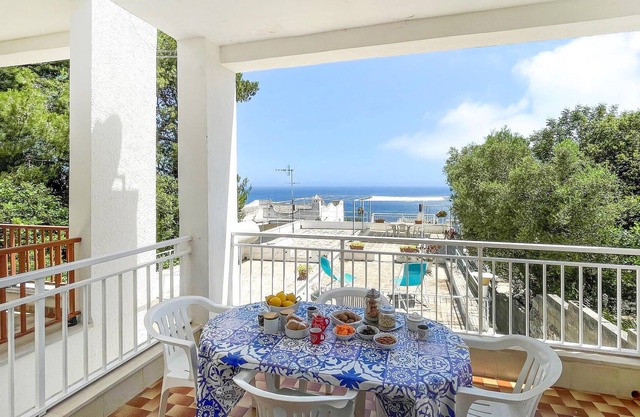 A terraced house with sea view built in 1985 on the southern tip of the heel of Italy.