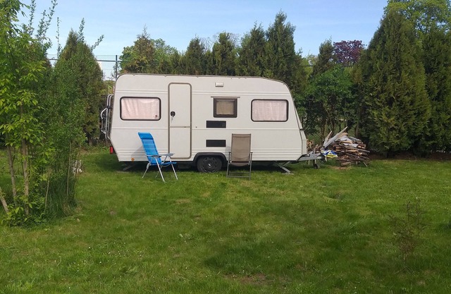 Air-conditioned caravan on a natural plot near Berlin for 4 persons near the lake