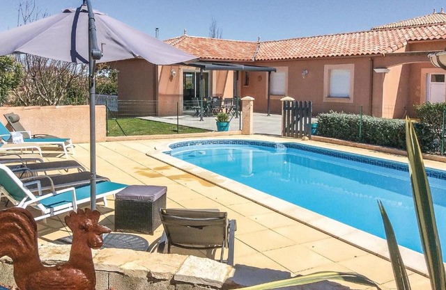 Amazing home in Puimisson with 4 Bedrooms, WiFi and Outdoor swimming pool