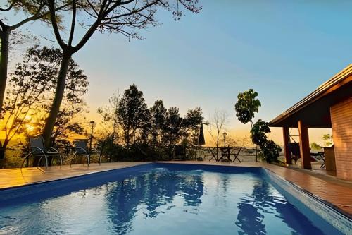 Casa de Campo Araxá na montanha com piscina