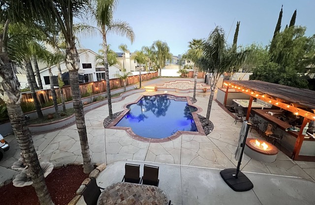 Centrally located beach-house themed resort style home with pool and hot tub