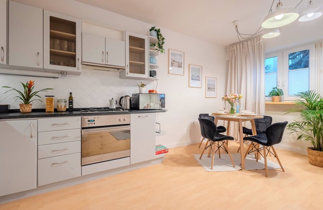 Charming Apartment Near Chopin Airport with Private Home Theater!