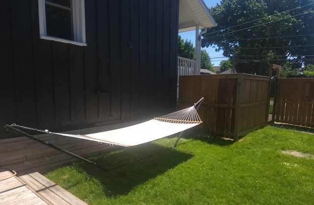 Cozy Red Brick Home away from Home with Hot Tub