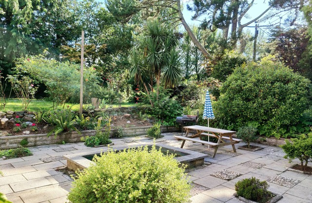 Croft Cottage, set in acres of mature gardens