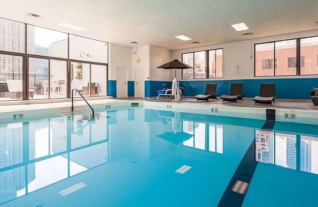 Dip into Heated Pool & Relax in 2 Modern Rooms | Walk to Chicago Riverwalk