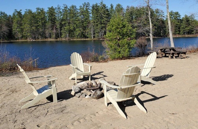 Edgewater Escape · Secluded Wooded Waterfront Home Near Lake Winn.