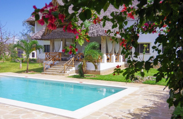 elegant and exclusive african style villa with chef and maid