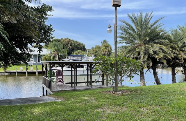 Fisherman's paradise! Private corner canal lot with boat ramp and dock