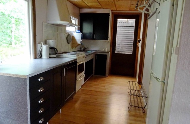 Holiday home with direct lake location and bridge