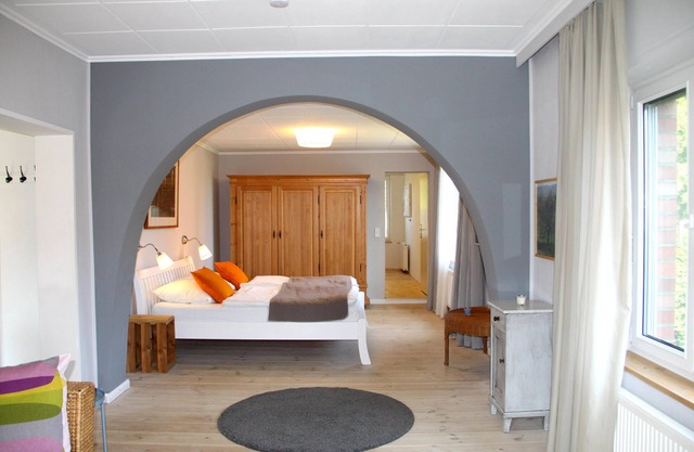 In the picturesque village green under the stork nest