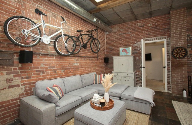 Leslieville LOFT with Wood Burning Fireplace and Skylights! Parking Included.