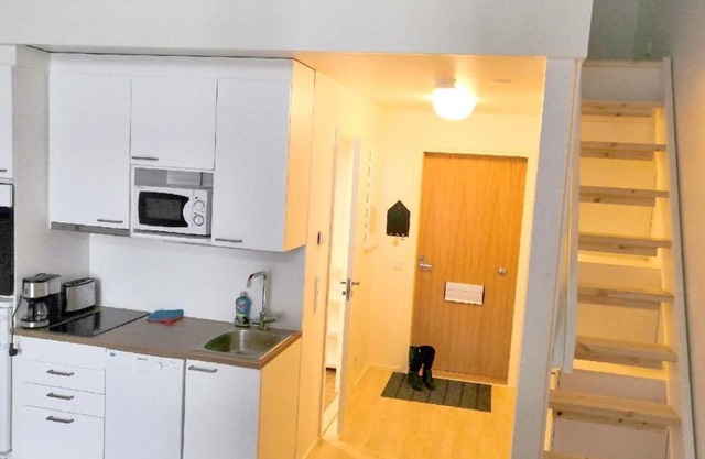 Loft next to train station & close to airport