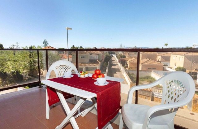 Lovely apartment for 4 people with A/C, pool, WIFI, TV and terrace