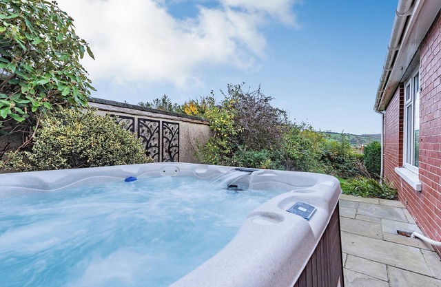 Lovely Bungalow in the Cambrian mountains with a private hot tub.