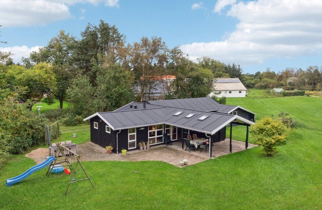 Lovely home in Strandby with kitchen