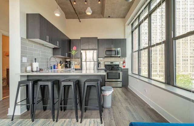 McCormick Place modern corner apartment with optional parking for up to 6 guests