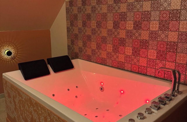 Medieval-themed accommodation; restored mansion with whirlpool bath