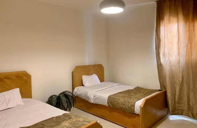New cozy apartment with WiFi, ACs, 10 min. away from Cairo International Airport