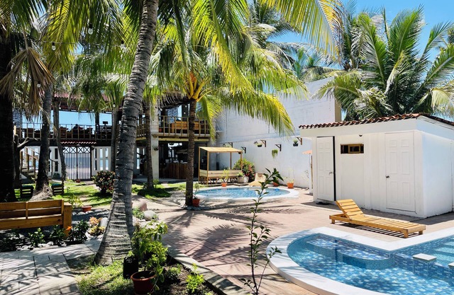 Oceanfront paradise in Surf city, steps away from the surf.