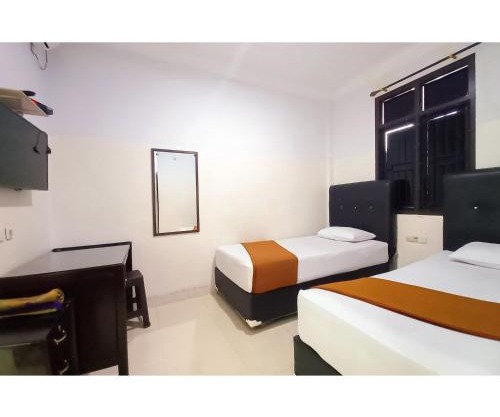 RedDoorz Syariah near Universitas Muhammadiyah Bungo