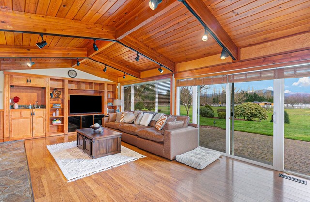 Remodeled home with private heated indoor pool, deck, hot tub, fireplace, grill