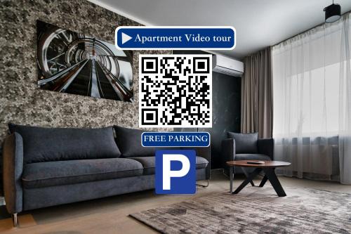 Scan QR code for apartment video tour - free parking, gym access, air conditioning, kitchen and more in central Riga