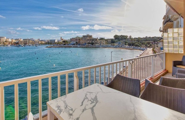 Seafront 2BR home with private balcony, AC & WIFI