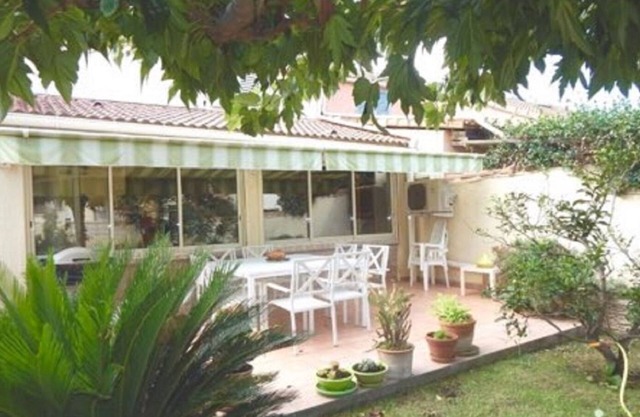 Seaside villa with terrace and garden