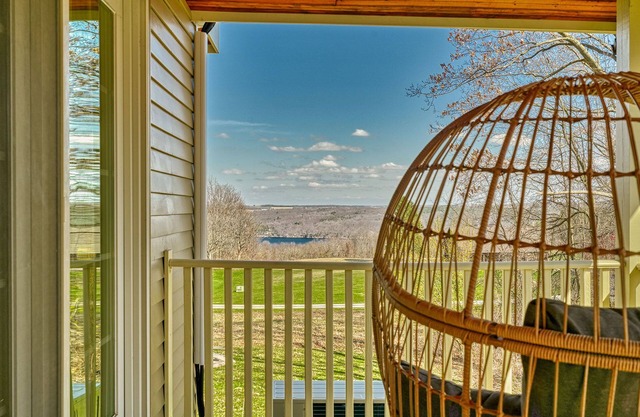 Secluded lakeview retreat w/wraparound deck & cozy contemporary charm!