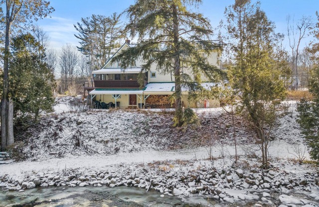 Spacious Farmhouse Estate Overlooking a Babbling Brook with hot tub