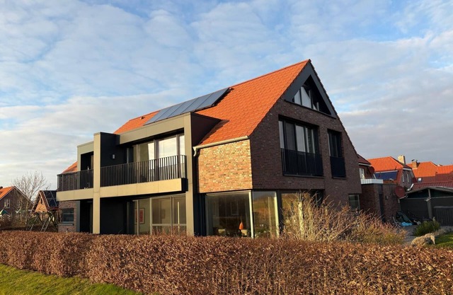 Spacious modern vacation home on the canal in Nordic design