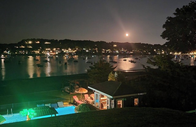 Vanderbilt area waterfront estate 3 bedroom 3.5 bath with fitness room & pool