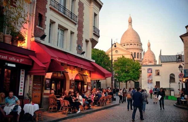 VIEW ON THE SACRE CŒUR- MONTMARTRE, OVERLOOKING THE ROOFTOPS OF PARIS