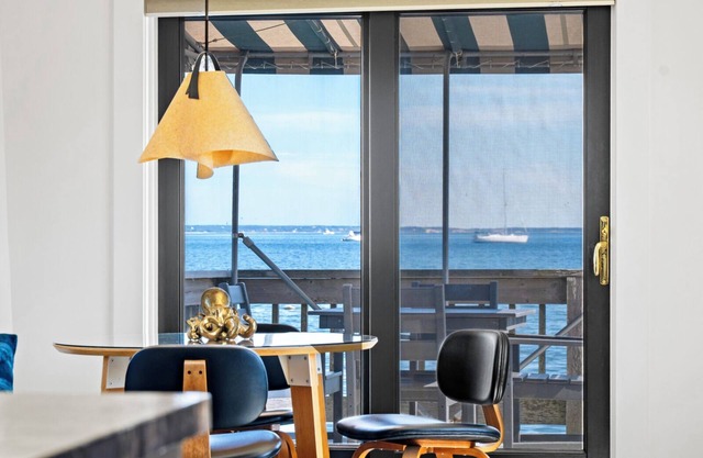 Your Provincetown beach escape. Steps from the sand with panoramic baysea views.