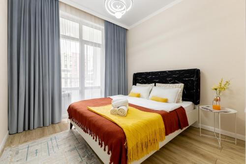 Nur-Sultan Apartment | Апартаменты возле Хан-Шатыра и Ботанического Сада