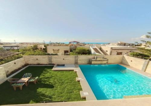Borg el Arab Villa | استمتع بالبحر والمسبح في فيلا راقية بأفضل موقع الساحل الشمالي