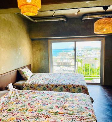 Maeganeku Apartment | シートピア恩納村Ocean 贅沢快適なデザイナーズ空間と蒼い海