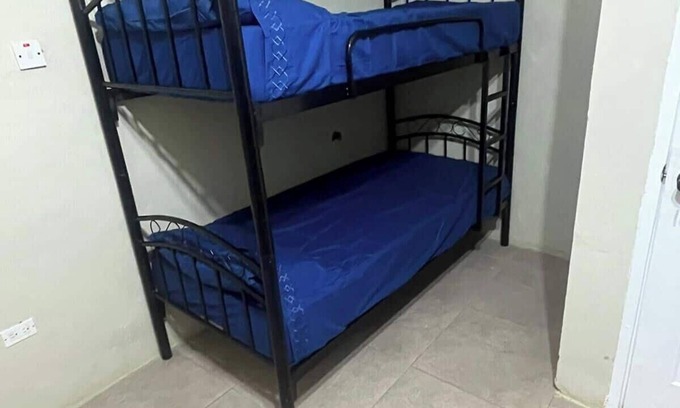 Mango Walk Apartment | 1 Bed in Shared Dorm - Backpackers Hoatel Montego Bay AC, Fan & hot water