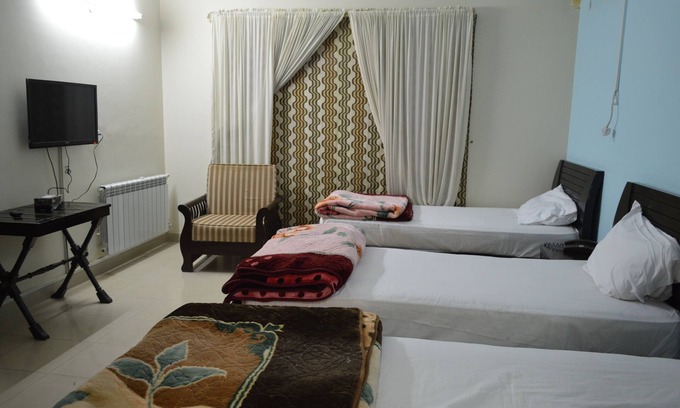 Islamabad House | 3 single bed with extra mattress