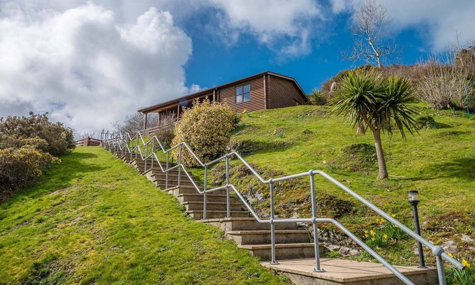 Mynytho Cottage | 5 star log cabin with sea views in Abersoch | Gorwel-Soch