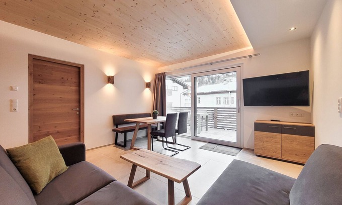 Bichlbach Apartment | 50m² modern holiday apartment with balcony, free swimming lake, 100 m from the ski area