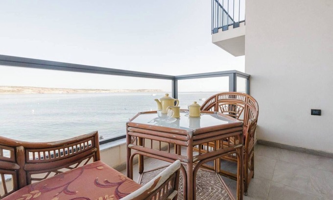 Għadira Apartment | A bright seafront apartment 🌅 with stunning Mellieħa Bay views, Maltese charm 🇲🇹, and spacious terraces made for sunset moments 🌊