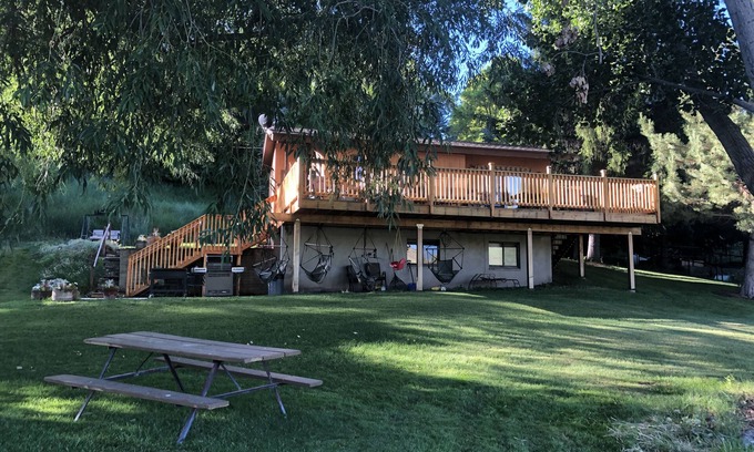 Hyrum Cabin | A wonderful, secluded 2 story cabin, deck, fire pit, stocked pond for fishing.