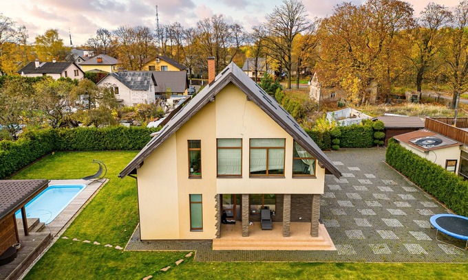 Latgale Suburb Villa | AmberVilla In a quiet place, next to the forest,near city center.Sauna with pool