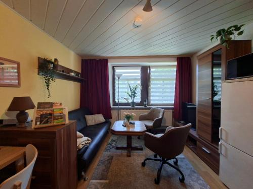 Gruenhain-Beierfeld Apartment | ansimali 1- Gemütliche FeWo mit Küche und Gartenblick in Grünhain-Beierfeld für Tierfreunde und Radliebhaber