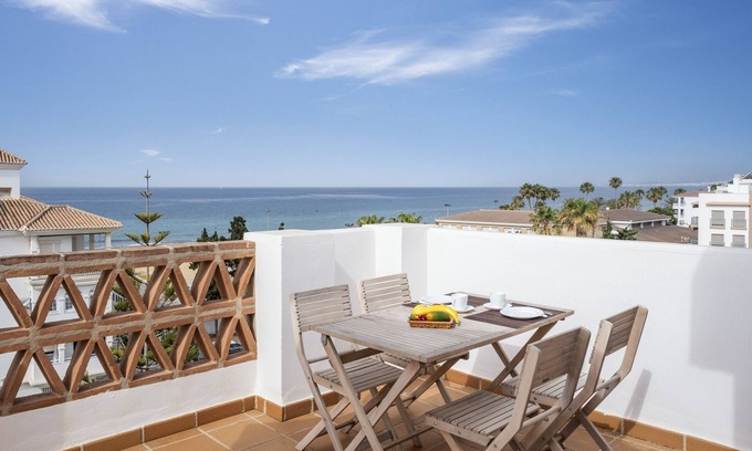 El Morche Apartment | Apartment 'Ático El Morche' with Sea View, Wi-Fi and Air Conditioning
